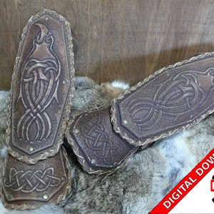 May include: Three brown leather arm guards with intricate Celtic knotwork and a bird design. The arm guards are on a white fur background. DIGITAL DOWNLOAD PDF text is in the lower right corner.