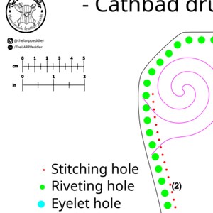 May include: A digital pattern template for a Cathbad druid item featuring a black outline, pink spiral lines, and green dots representing riveting holes. A legend defines red dots as stitching holes, green as riveting holes, and a 5 cm or 2 inch scale.