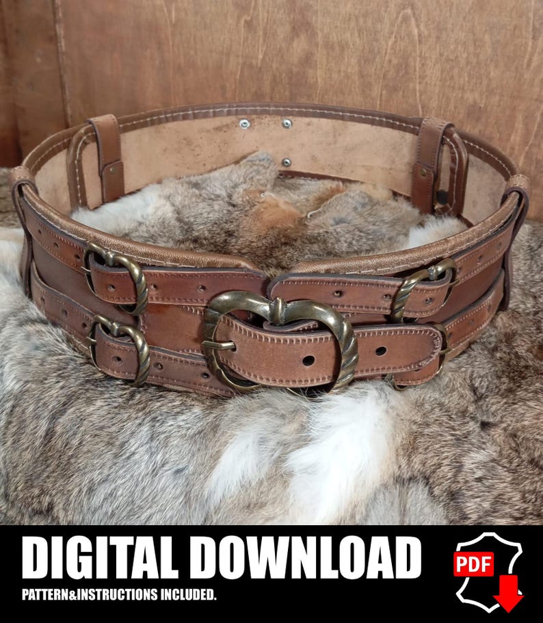 May include: A brown leather belt with multiple straps and antique brass buckles. The belt features a large heart-shaped buckle in the center and is designed with a layered construction. The image includes the text "DIGITAL DOWNLOAD" and "PATTERN & INSTRUCTIONS INCLUDED."
