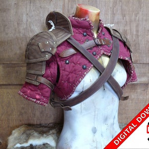 May include: A red quilted fabric garment with brown leather shoulder armor and straps. The garment is worn on a mannequin. The image includes the text "DIGITAL DOWNLOAD PDF".