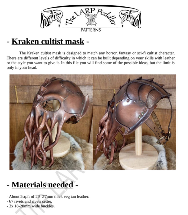 May include: A brown leather mask featuring a smooth, rounded upper section with riveted panels and multiple long, dangling tentacle-like appendages extending from the front. The mask includes an adjustable strap with a metal buckle.