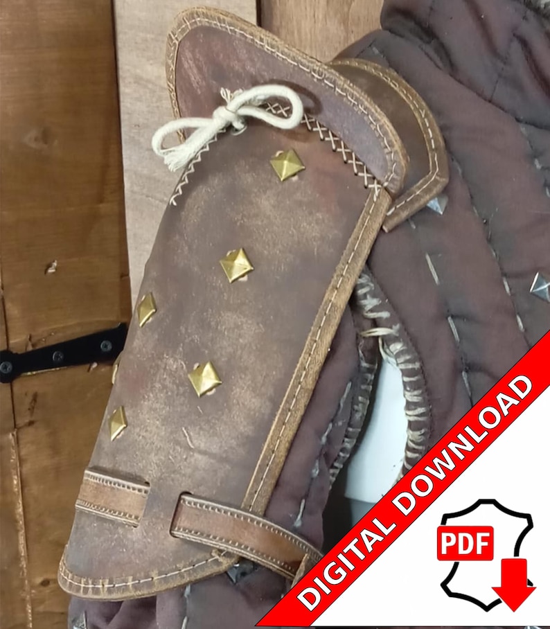 May include: A brown leather arm guard with gold metal studs and a strap. The arm guard is worn on a brown fabric garment. The text "DIGITAL DOWNLOAD PDF" is in red on a white background.
