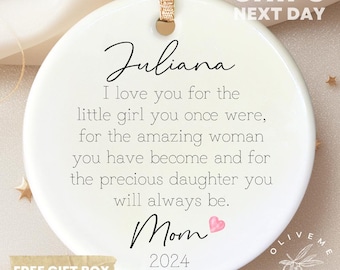 May include: White ceramic ornament with a gold ribbon, featuring the text "Juliana" and a heartfelt message: "I love you for the little girl you once were, for the amazing woman you have become and for the precious daughter you will always be. Mom 2024".