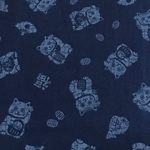white lucky cat on navy poplin cotton fabric made in Japan
