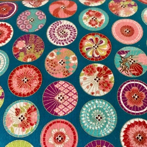 May include: Teal fabric with a repeating pattern of colorful, circular, Japanese-style umbrellas. Each umbrella has a different design and color scheme, including pink, red, gold, and blue.