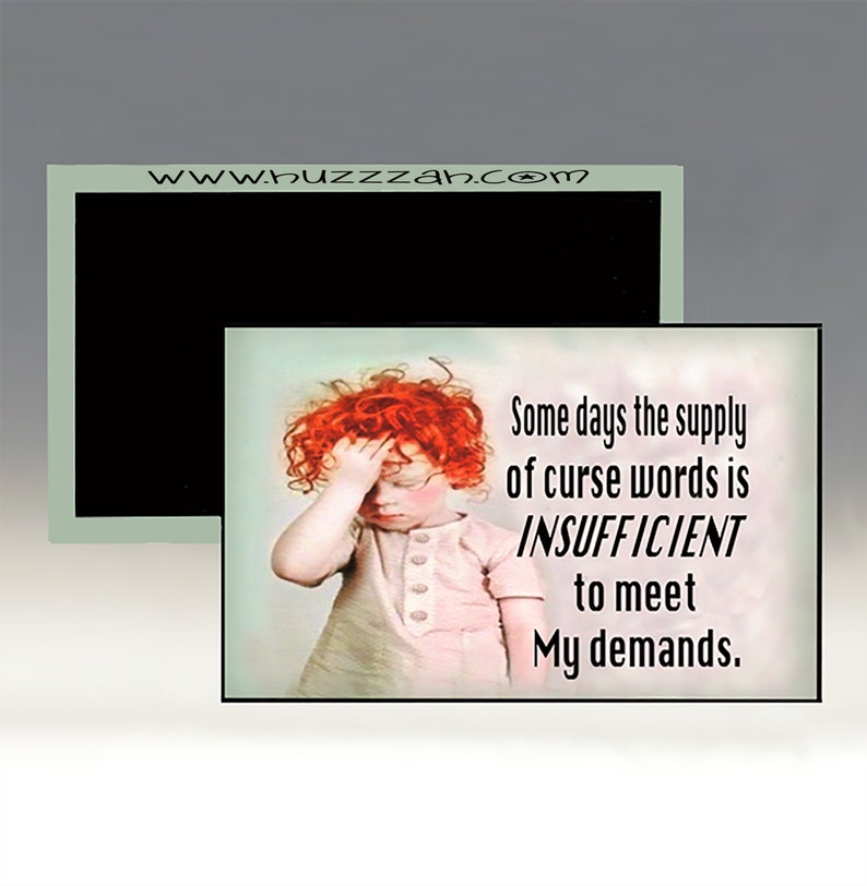 May include: A framed print with the text "Some days the supply of curse words is INSUFFICIENT to meet My demands." The image features a child with red hair holding their head. The website address "www.buzzzah.com" is also visible.