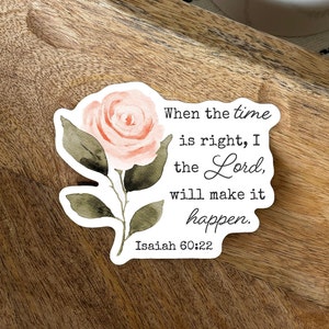 Pink rose with Isaiah 60:22 in typewriter text.