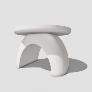 May include: White modern stool with a rounded top and a curved base. The stool is made of a smooth, white material.