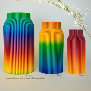 May include: Three rainbow colored vases in different sizes. The largest vase is labeled "Xtra Large", the middle vase is labeled "Large", and the smallest vase is labeled "Regular". The text "Rainbow Color Option varies by size and will be unique each time." is below the vases.