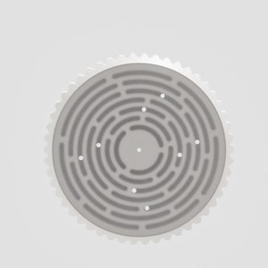 May include: A white circular shower drain with a textured surface and multiple small holes.