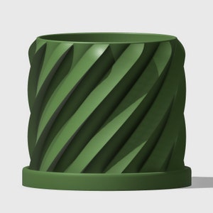 May include: A dark green ceramic planter with a unique spiral design. The planter has a wide base and a slightly narrower top.