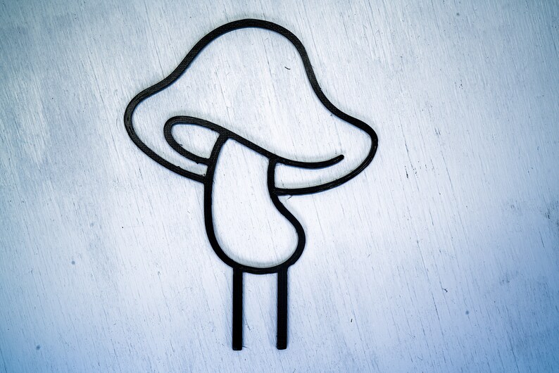 Peut inclure: Un dessin au trait noir d'un champignon sur un fond blanc.