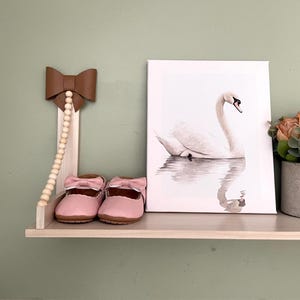 Handcrafted Wooden Floating Shelf with Beads and Leather Bow. Nursery and Kids Room Shelf for Toys, Books. Playroom Storage. Entryway Decor