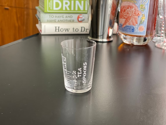 Vintage Glass Jigger Measuring Shot Glass 2 Oz, With White Applied  Lettering 