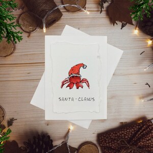 Crabe du Père Noël pinces - Cartes de vœux aquarelles amusantes - Voeux de Noël peints à la main avec jeux de mots, cartes uniques faites main pour les fêtes