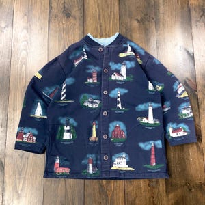 1990年代のヴィンテージ、灯台、航海風プリント、ボタン付きカーディガン、セーター / アメリカ製 / タグサイズ L (小さめです。寸法をご確認ください)