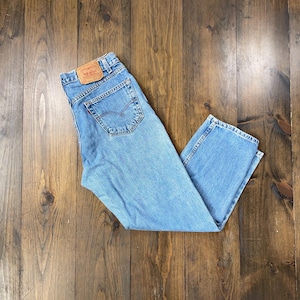 Vintage 1990s Levis 550 Relaxed Fit Jeans Pants / 35x30 / made in USA / see description measurements