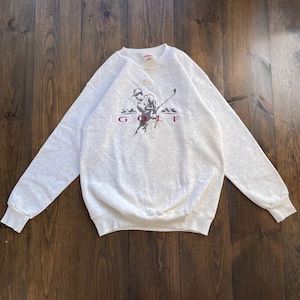 Vintage 1990s Golf Man Swinging Nutmeg Embroidered Crewneck Sweatshirt / made in USA / size Medium