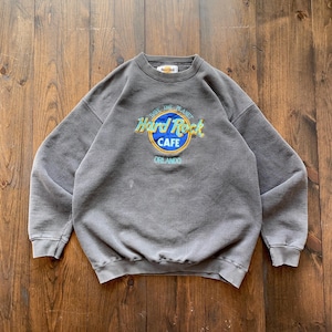 Sudadera vintage de cuello redondo con bordados del Hard Rock Cafe Orlando de los años 90. Fabricada en EE. UU. y talla grande.