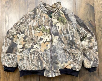 Chaqueta bomber de camuflaje reversible RealTree vintage de los años 90. Consulta las medidas para conocer la talla.