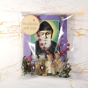 Set of oil, water, incense, soil, relic, rosary and novena booklet of Saint Charbel image 2