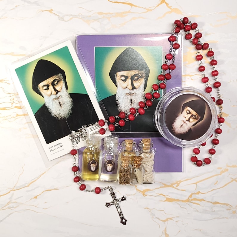 Set of oil, water, incense, soil, relic, rosary and novena booklet of Saint Charbel image 9