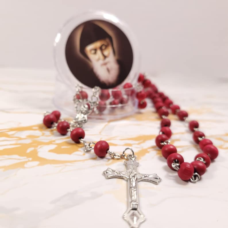 Set of oil, water, incense, soil, relic, rosary and novena booklet of Saint Charbel image 5