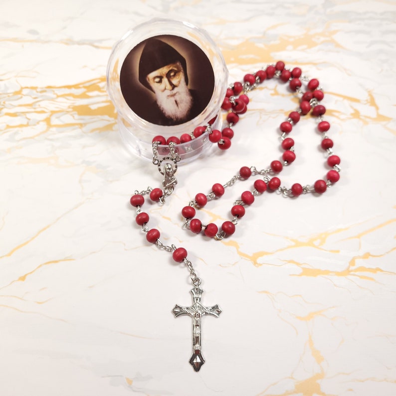 Set of oil, water, incense, soil, relic, rosary and novena booklet of Saint Charbel image 8