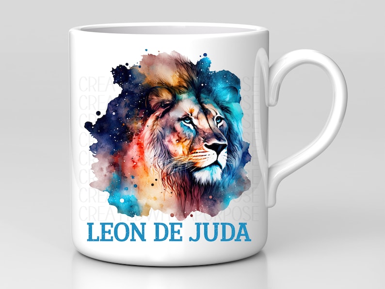 May include: White ceramic mug with a colorful watercolor illustration of a lion's head with the text "LEON DE JUDA" in blue lettering.