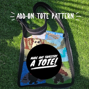 May include: A black and white tote bag with a crocheted design. The bag has a black strap and is filled with a book. The text on the bag reads "Make any tapestry a tote!"