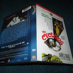 May include: DVD case for the 1963 film "The Cyclops" featuring a close-up of a giant cyclops eye and the tagline "Nature Gone Mad!"  The case also features a photo of James Craig, the film's star.