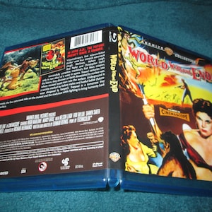 May include: Blu-ray disc case for the film "World Without End" featuring a woman in a red and black dress holding a spear. The back of the case has a description of the film and credits.