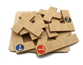 Wooden game with pentominoes, The 7 days of the week