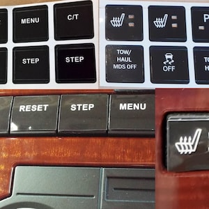 Puede incluir: Primer plano del salpicadero de un coche con varios botones negros etiquetados con texto blanco. Los botones incluyen "RESET", "MENU", "C/T", "TEMP", "STEP", "TOW/HAUL MDS OFF", "OFF", "TOW/HAUL" y "P OFF".