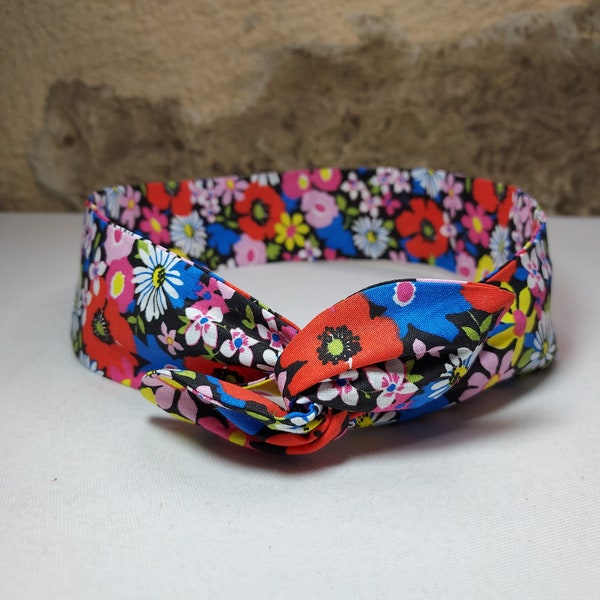 Hairband twist headband wire multicolored flowers black background