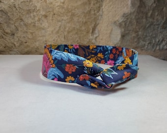 Hairband, wire headband, pink flowers, brick orange, blue background