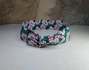 pink and green wire headband with water lily flowers