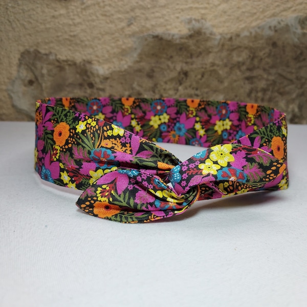 Bandeau cheveux twist headband fil de fer fleurs multicolores fond noir