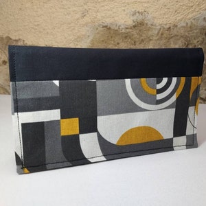 Porte chéquier motifs seventies noir gris blanc et moutarde