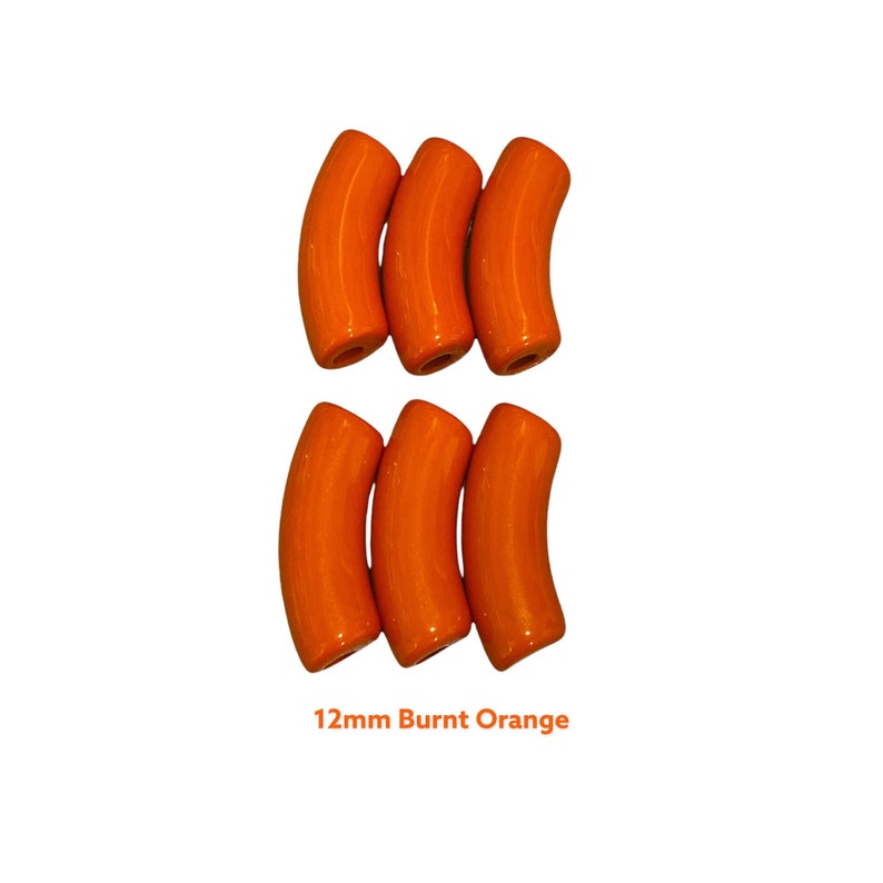 May include: Six burnt orange curved beads, each 1.2cm in length, arranged in two rows of three. The beads have a glossy finish and a cylindrical shape with a slight curve. Text at the bottom reads "12mm Burnt Orange".