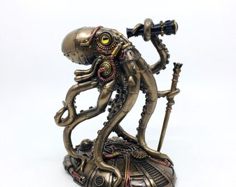 Puede incluir: Una figura de pulpo color bronce con detalles de engranajes mecánicos, un ojo amarillo y tuberías de tono cobre. El pulpo sostiene un telescopio negro en un tentáculo y un bastón delgado en otro, sobre una base circular.