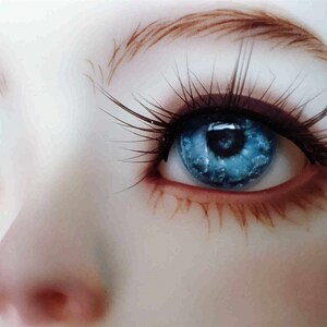 May include: Close-up of a pair of blue eyes with long eyelashes. The eyes are surrounded by a light brown eyebrow and a light pink eyelid.