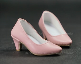 May include: A pair of pink high-heeled shoes with a pointed toe.