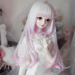 May include: A long, straight, white wig with pink ombre tips. The wig has bangs and is styled in a layered look.
