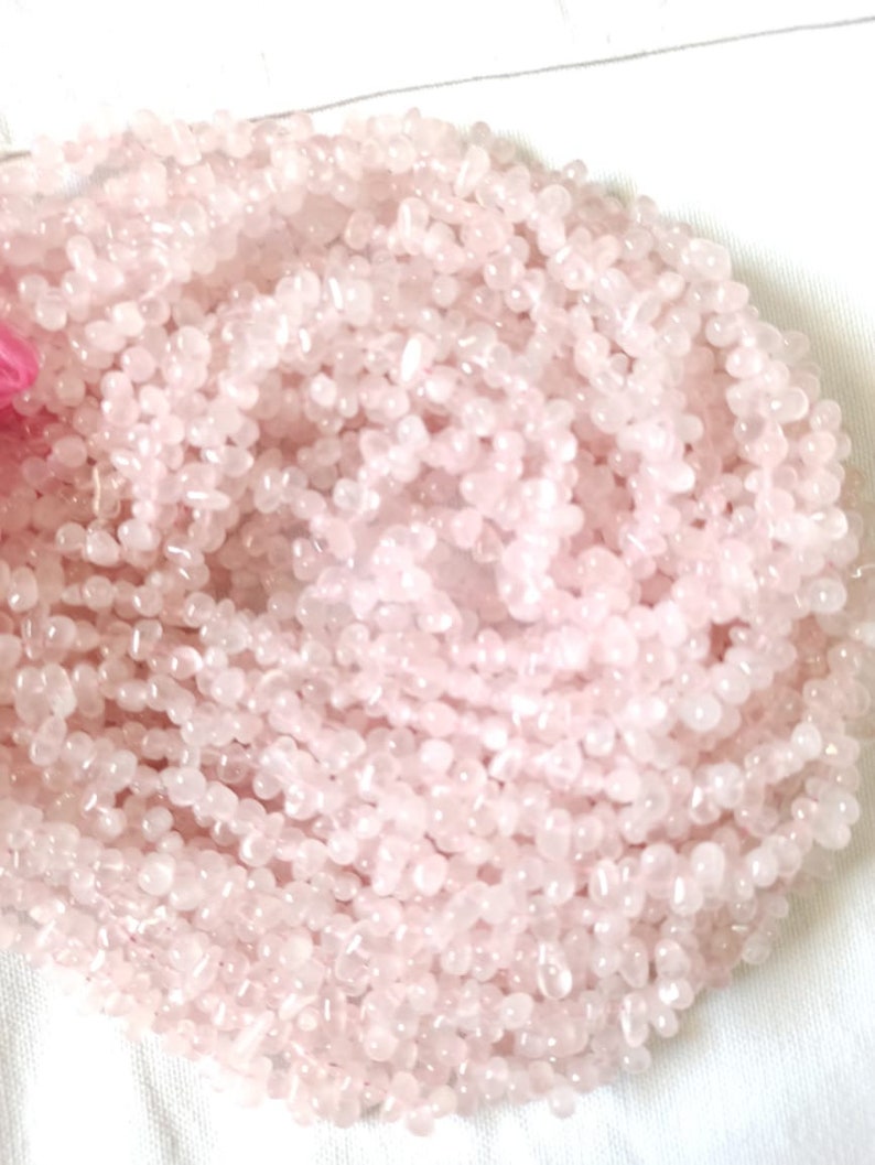 5*7 approx AAA Quality natural Rose Quartz smooth drops 13 inch strand size