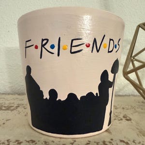 Hand‑Painted Terracotta pot featuring the FRIENDS Cast & Couch