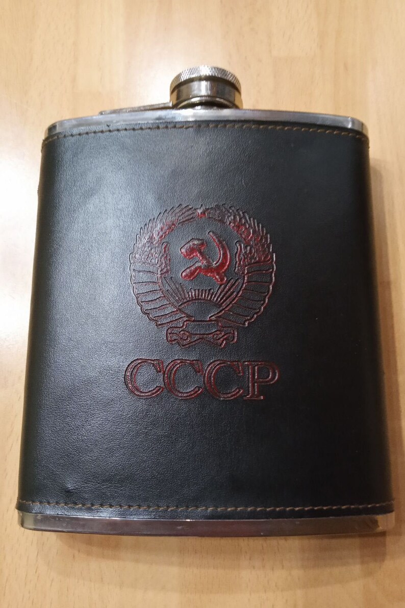 Faux leather wrapper. A flask in a black case with a coat of arms Soviet army flask
