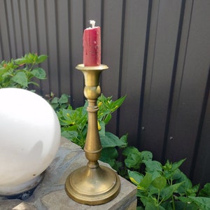 Beautiful brass candlestick.Vintage candlestick in Victorian style.Vintage candlestick Bronze.Good candlestick. Antiques of the last century