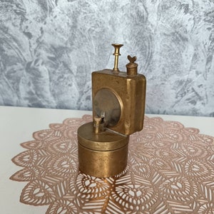 Antique metal lamp.Vintage open kerosene lantern.Retro oil lamp.Home decor.