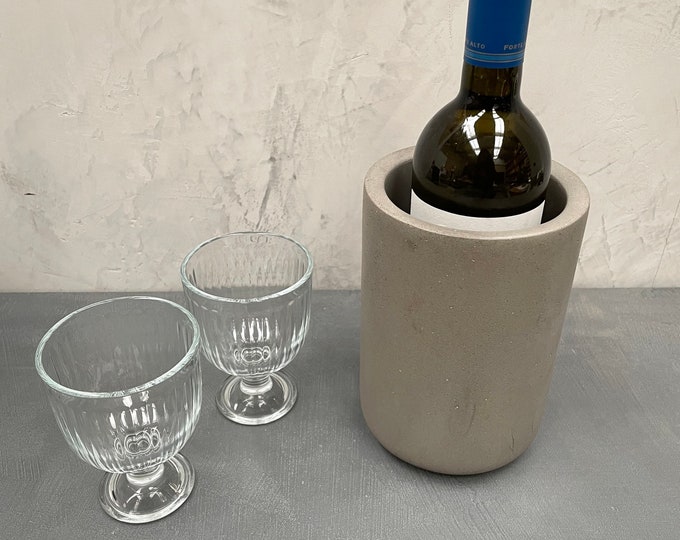 Concrete wine cooler available in black or grey.